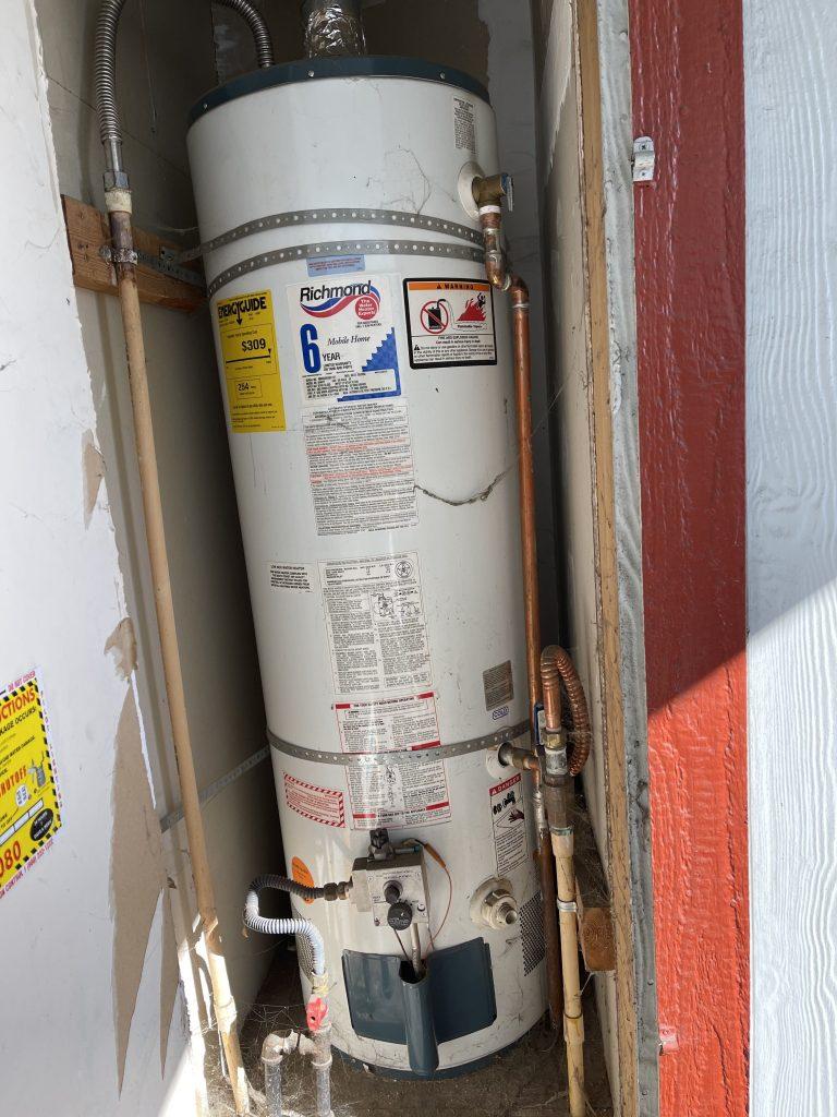 Detailed view of a water heater repair in process in a nearby Cupertino home, demonstrating our convenient and professional service