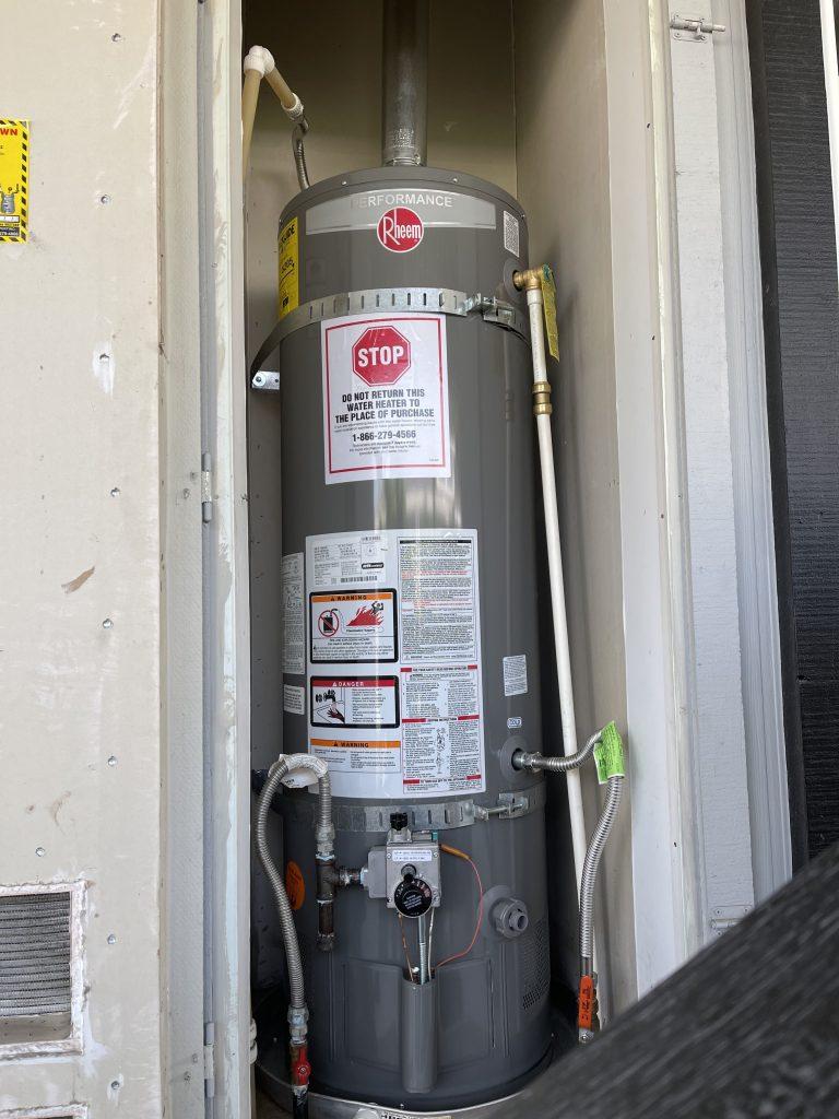 Image of a water heater being repaired in a Palo Alto home, showcasing our reputable service