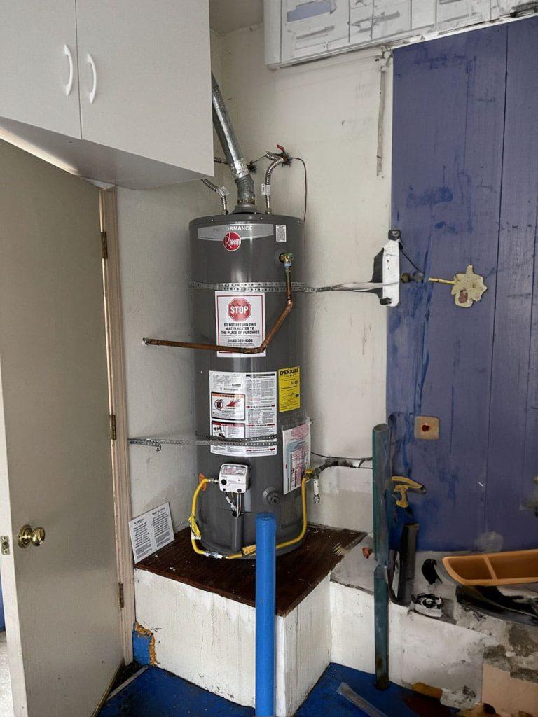 United Plumbing's expert installing a powerful hot water heater in a Cupertino home