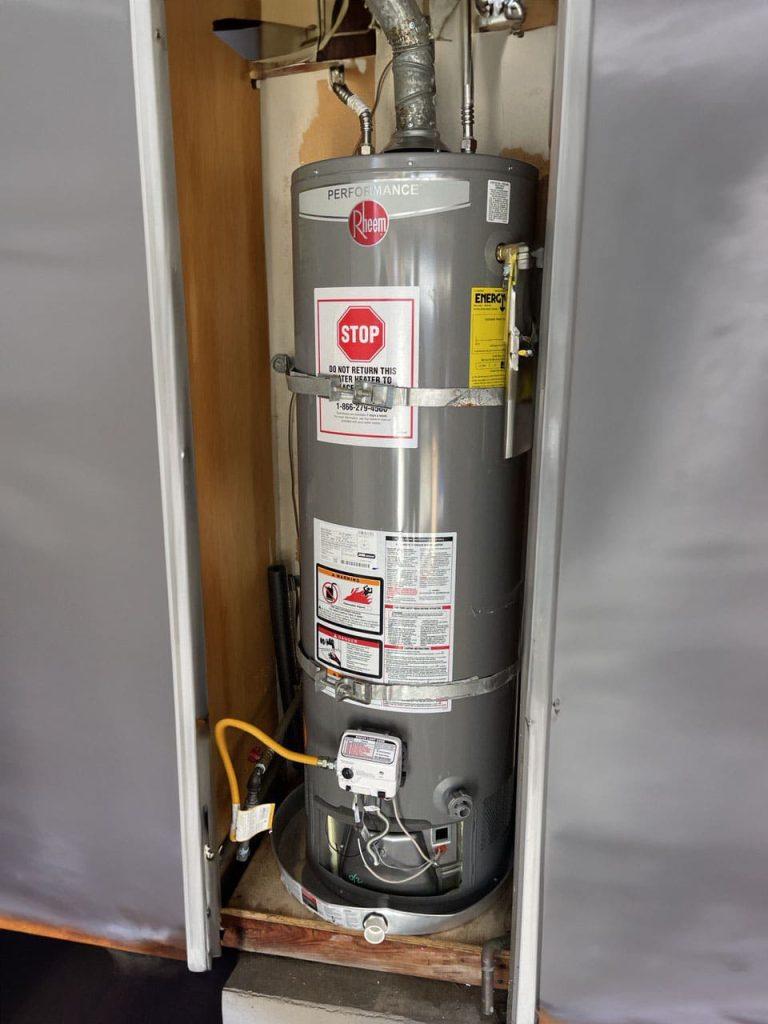 United Plumbing pro replacing a hot water heater in a Cupertino home
