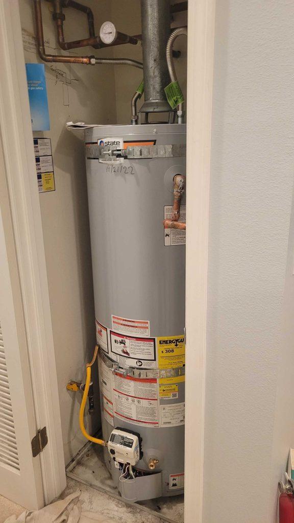 A plumber installing a water heater in Foster City | United Plumbing