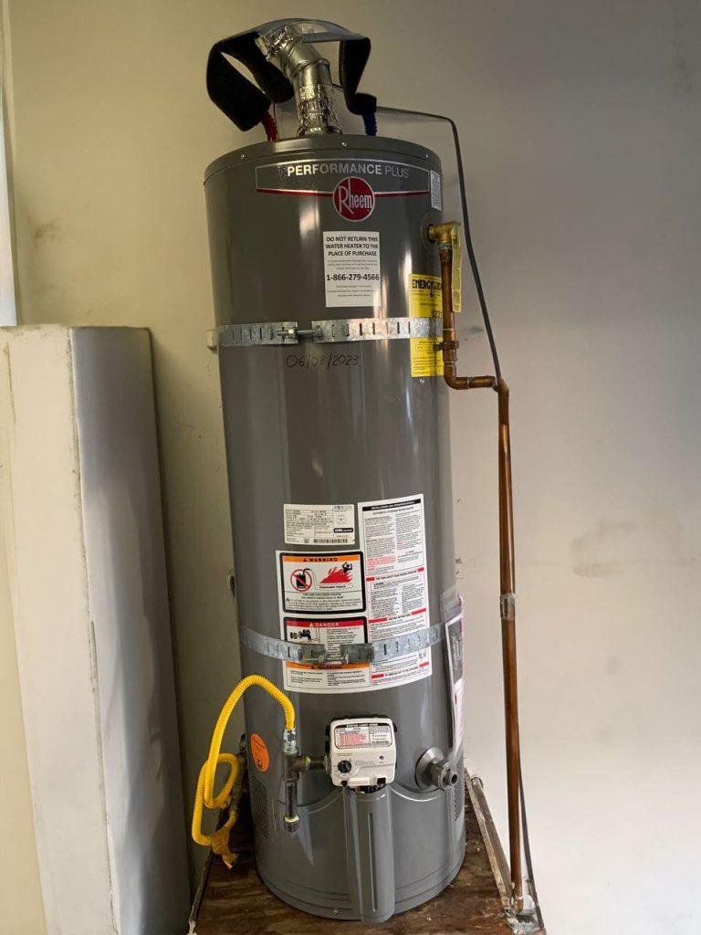 United Plumbing's expert installing a powerful hot water heater in a Los Gatos home