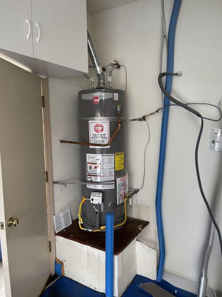 United Plumbing pro replacing a hot water heater in a Los Gatos home