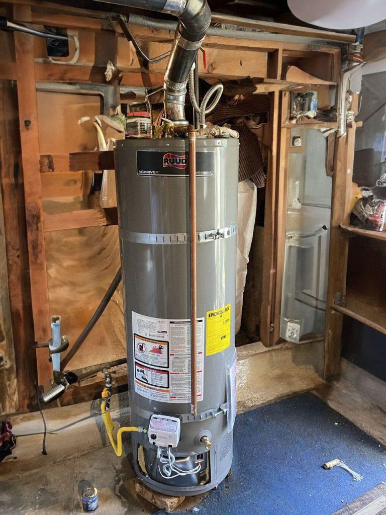 United Plumbing's expert installing a powerful hot water heater in a Mountain View home