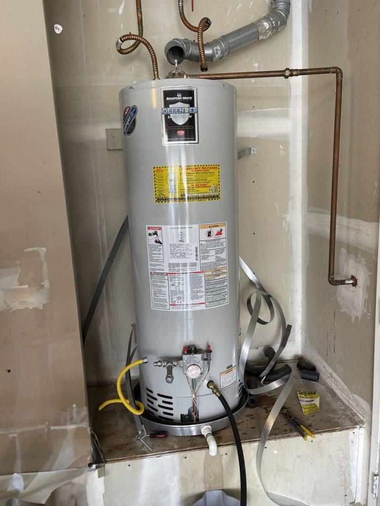 United Plumbing pro replacing a hot water heater in a Palo Alto home