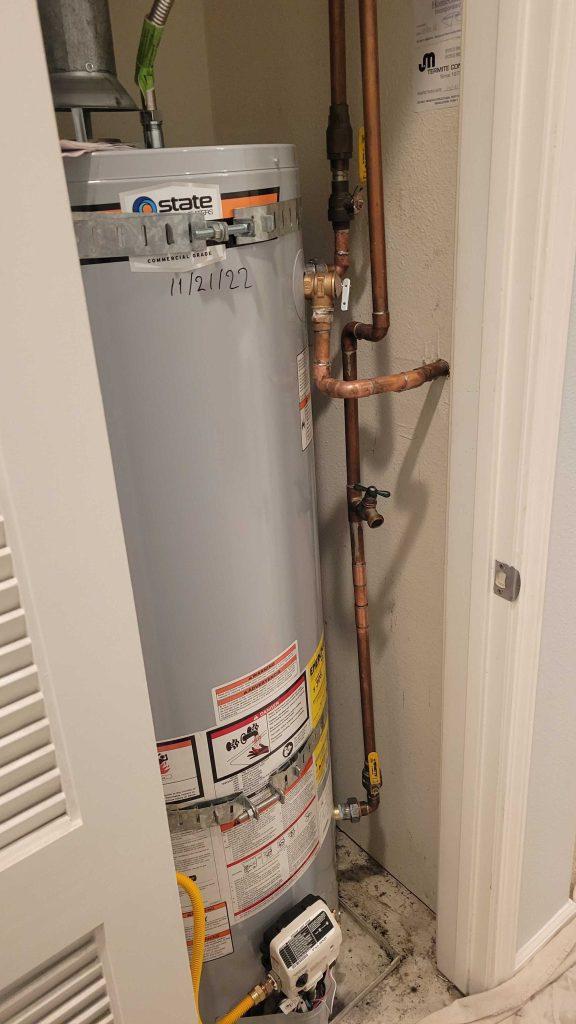 A plumber performing water heater installation in Redwood Shores | United Plumbing