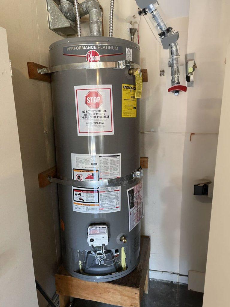 United Plumbing's expert installing a powerful hot water heater in a San Jose home