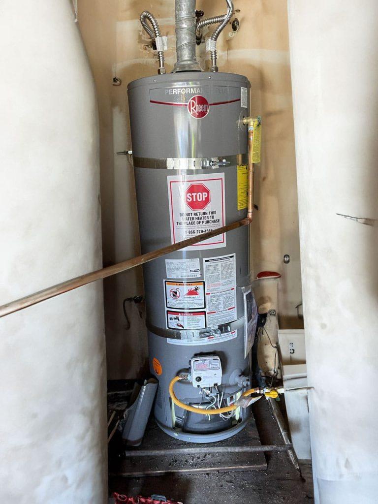 United Plumbing pro replacing a hot water heater in a San Jose home