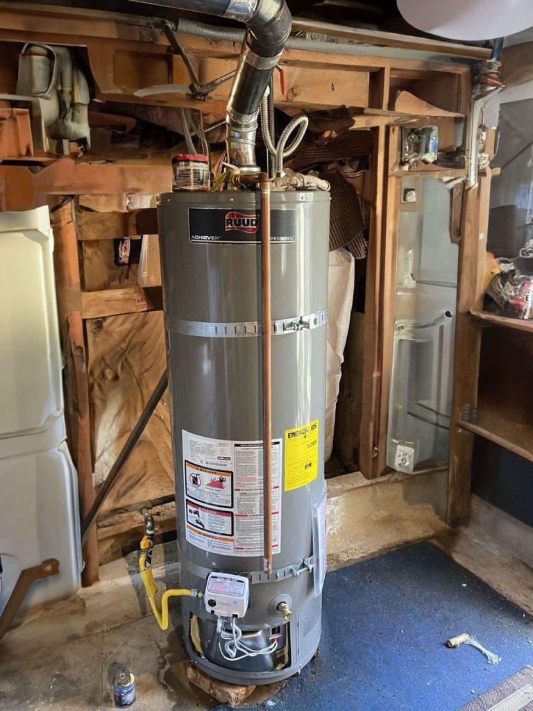 United Plumbing's expert installing a powerful hot water heater in a Saratoga home