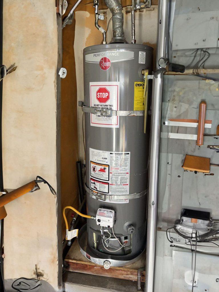 United Plumbing's expert installing a powerful hot water heater in a Sunnyvale home