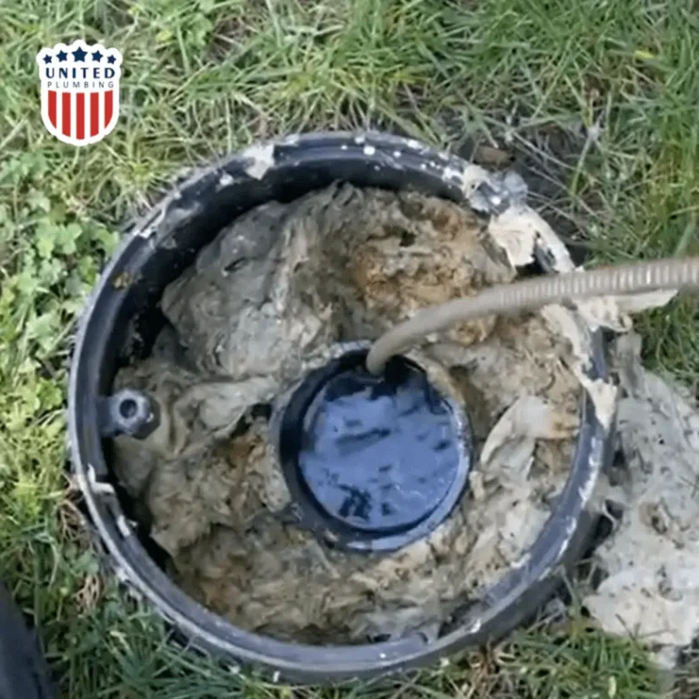 Feed the auger cable into the drain pipe through the cleanout access point