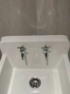 Utility sink faucet installation